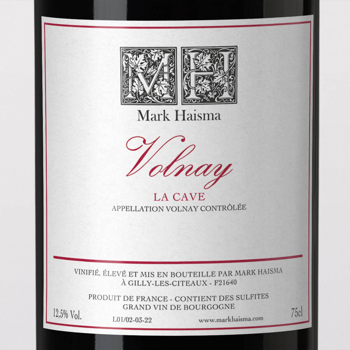 Mark Haisma Volnay La Cave wine bottle label with red text and black ornate initials