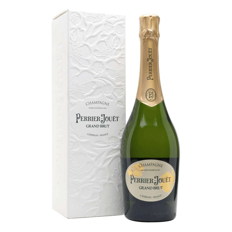 Perrier-Jouet Grand Brut Champagne bottle and white floral gift box from France