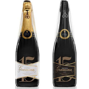 Two bottles of Gramona Enoteca Brut Nature Gran Reserva, one with gold foil and one with black foil