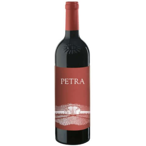 Bottle of Petra IGT Toscana wine showcasing its elegant label and rich red color.